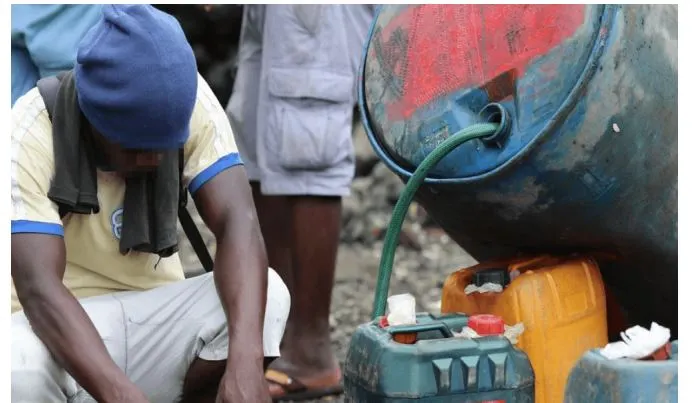 Black market thrives as petrol stations operate at night, shutting out motorists.
