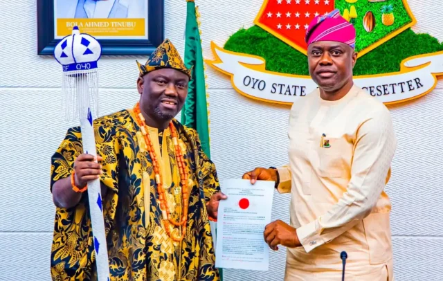 Seyi Makinde presenting the certificate to the 46th Elect Alaafin of Oyo, Prince Owoade Abimbola