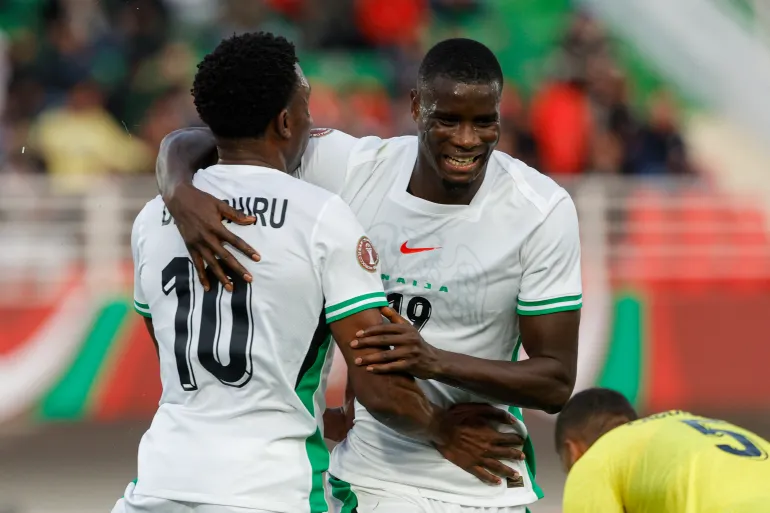 Onuachu, right, celebrates scoring with Dele-Bashiru at the 2025 AFCON [AFP]