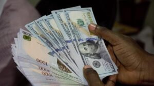 Naira exchange rate reaction to CBN interest rate cut.