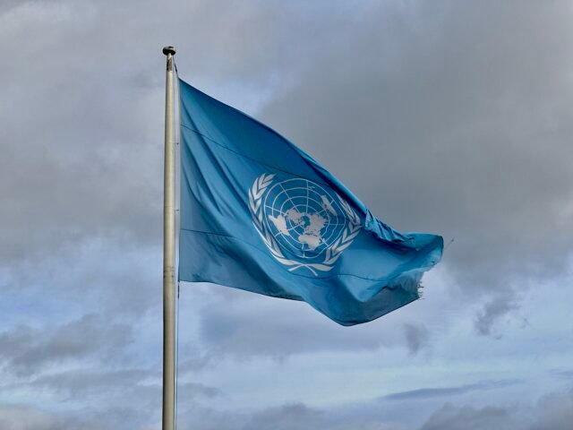 United_Nations_UN_flag_FN-flagget_waving_on_flagpole._Heavy_clouds._ARKIVET_Peace_and_Human_Rights_Centre._Vesterveien_4_Bellevue_Kristiansand_NORWAY_2023-10-17_IMG_3723 UN Calls for Global Input to Protect Human Rights Defenders in the Digital Age